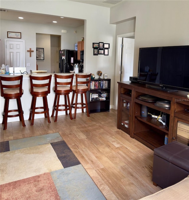 living room with light wood-type flooring