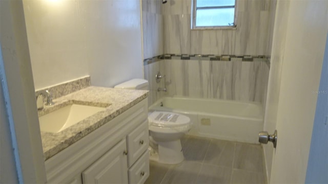 full bathroom featuring vanity, tile patterned floors, toilet, and shower / bathtub combination