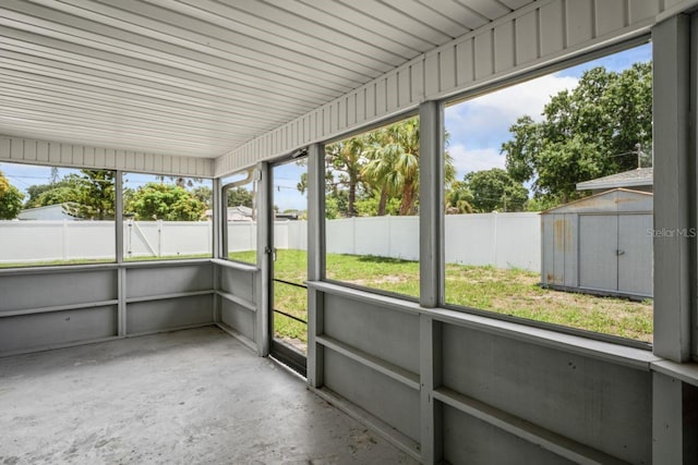 unfurnished sunroom with plenty of natural light