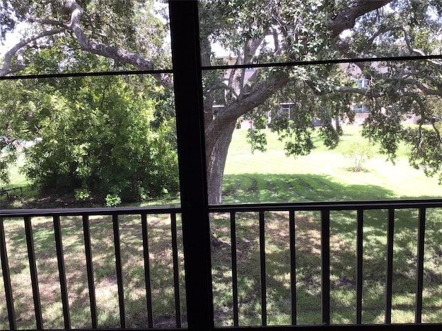 view of yard with a balcony