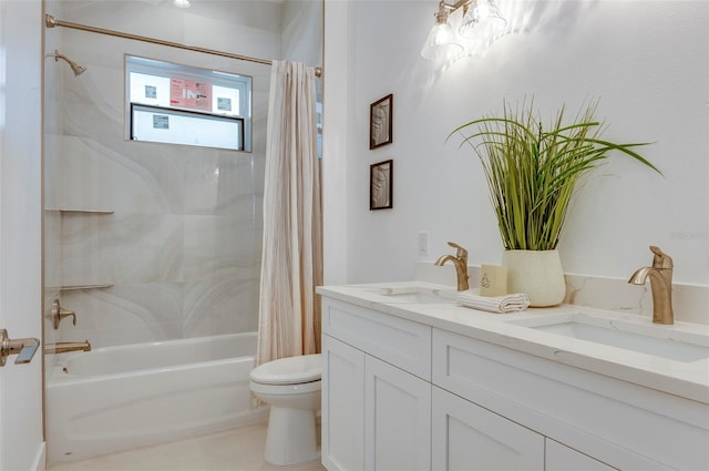 full bathroom featuring vanity, toilet, and shower / tub combo with curtain