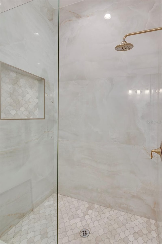 bathroom featuring walk in shower