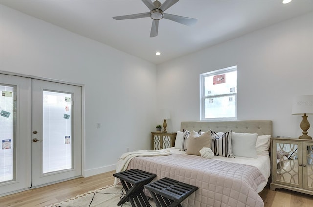 bedroom with recessed lighting, a ceiling fan, baseboards, french doors, and light wood finished floors