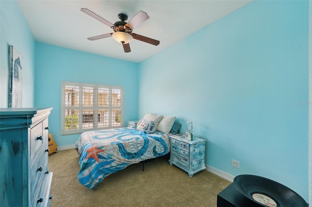 bedroom featuring ceiling fan and light carpet