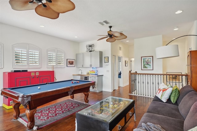 recreation room with ceiling fan, dark wood-type flooring, and pool table