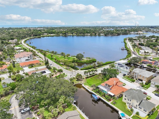 bird's eye view with a water view