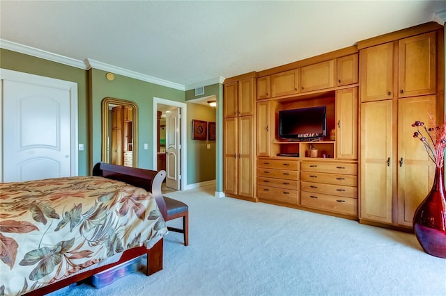 carpeted bedroom with ornamental molding