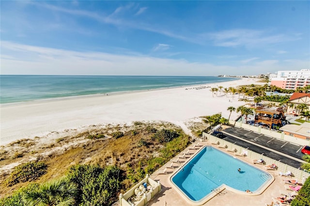 bird's eye view with a beach view and a water view