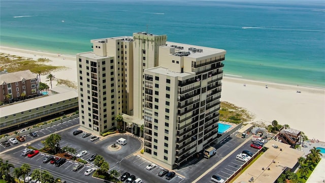 aerial view with a view of the beach and a water view