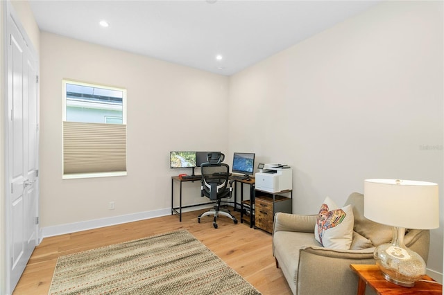 home office featuring light hardwood / wood-style floors