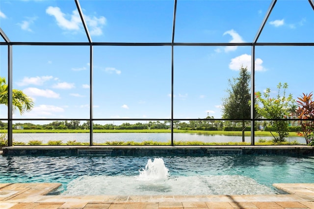 view of swimming pool featuring a water view, pool water feature, and a lanai