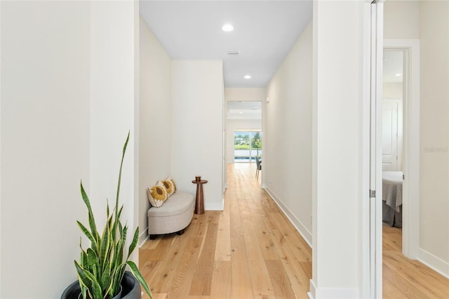 corridor featuring light hardwood / wood-style flooring