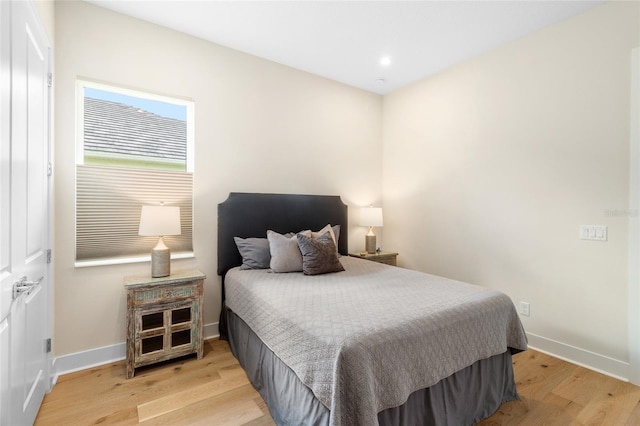 bedroom featuring light wood-type flooring