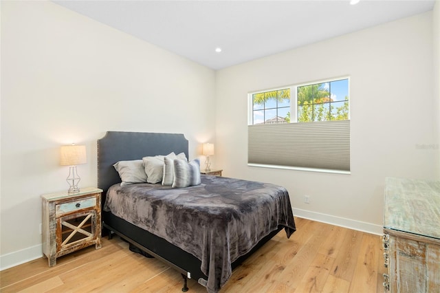 bedroom with light hardwood / wood-style flooring