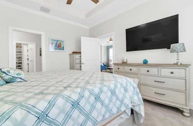 bedroom with ceiling fan, ornamental molding, and light carpet