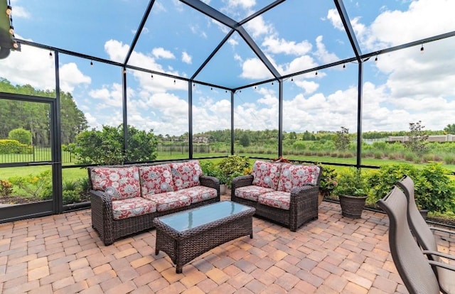 exterior space featuring an outdoor living space and a lanai