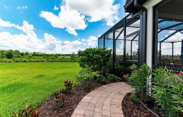 view of yard with a lanai