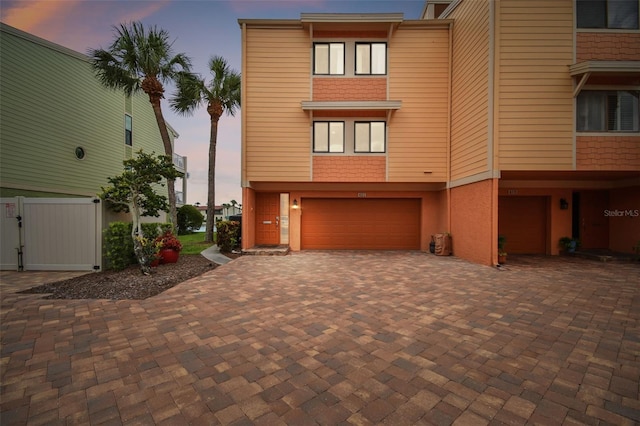 view of front of home with a garage