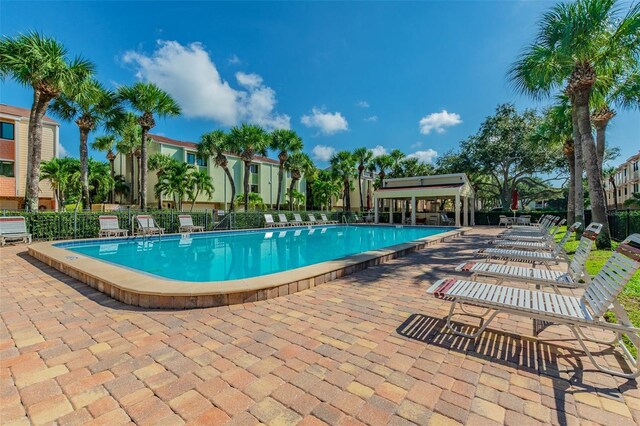 view of swimming pool featuring a patio area