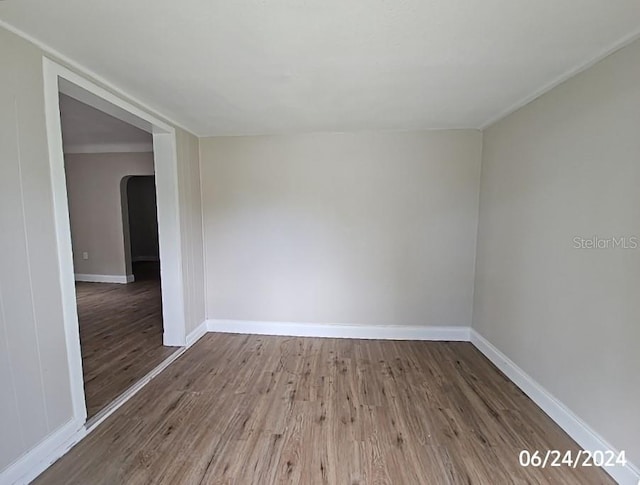 empty room featuring wood-type flooring