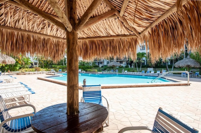 view of swimming pool featuring a patio