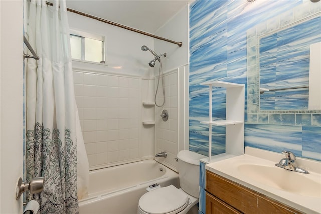 full bathroom featuring vanity, shower / bathtub combination with curtain, and toilet