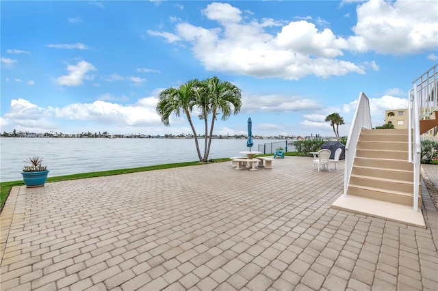 view of patio / terrace featuring a water view