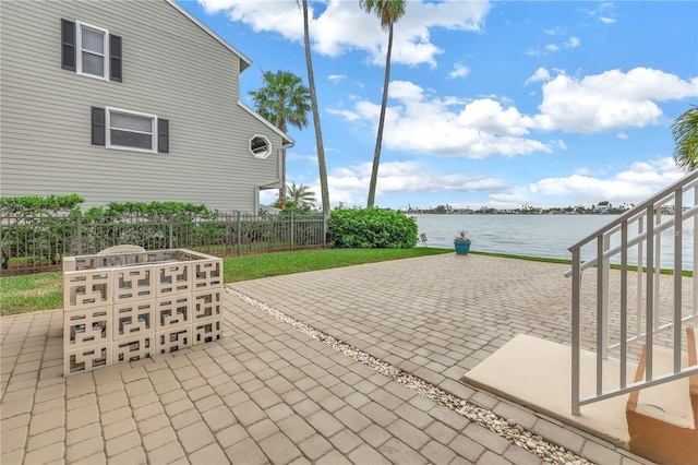 view of patio / terrace with a water view