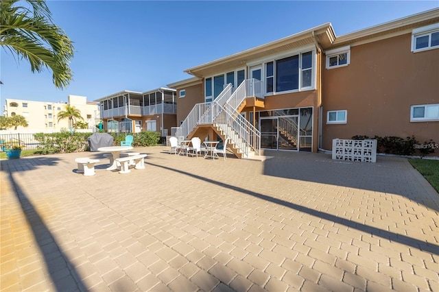 rear view of house featuring a patio area