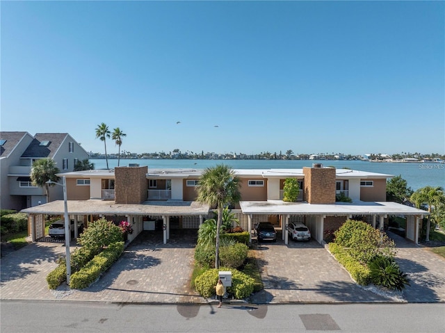 exterior space with a water view