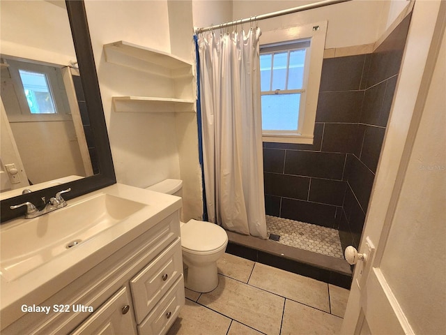 bathroom with tile patterned flooring, plenty of natural light, curtained shower, and toilet