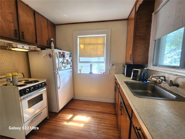 kitchen with sink, white electric range, backsplash, and dark wood-type flooring