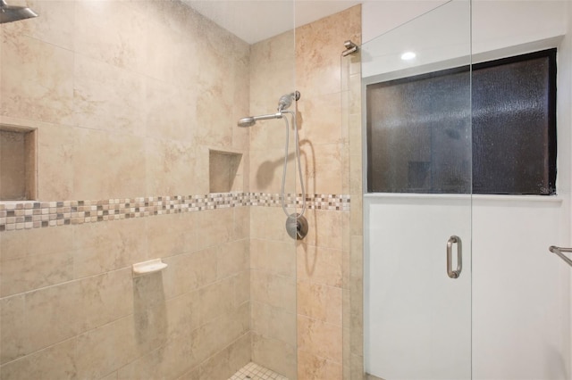 bathroom featuring walk in shower