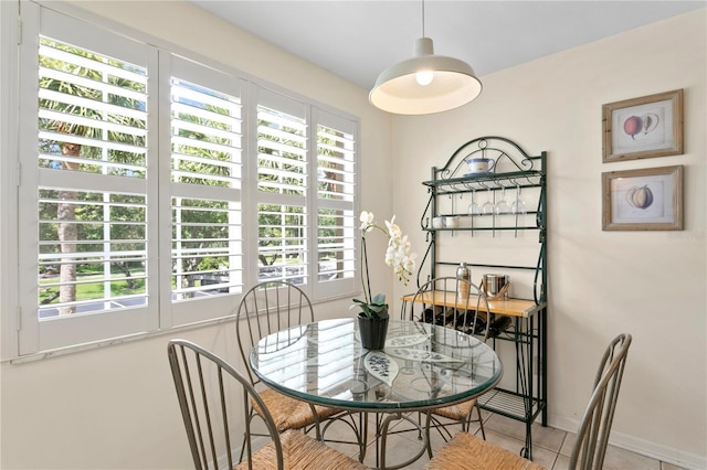 dining room featuring light tile patterned floors