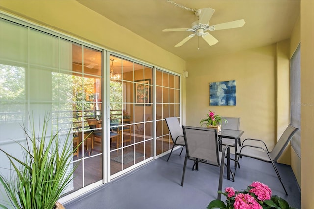 sunroom / solarium with ceiling fan