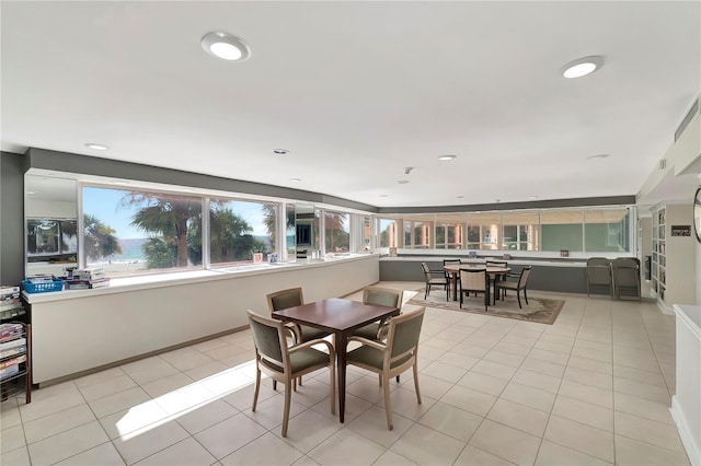 dining area featuring light tile patterned floors