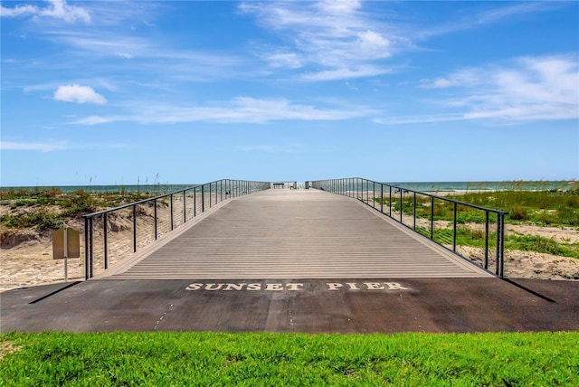 surrounding community featuring a water view