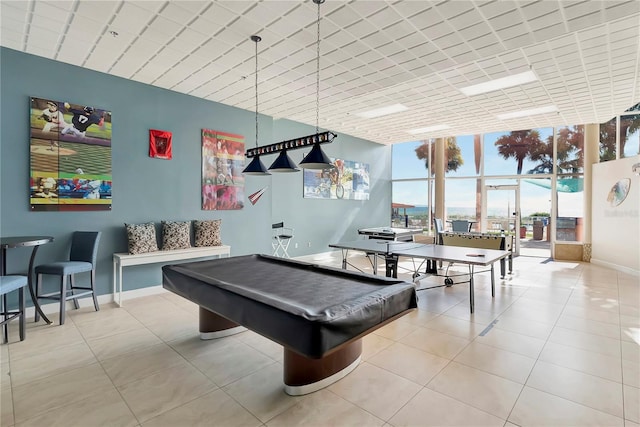 recreation room with expansive windows and pool table