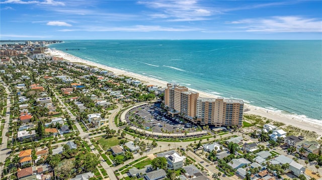 aerial view featuring a water view and a view of the beach