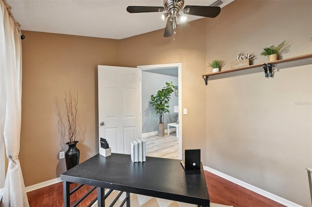 home office featuring ceiling fan and wood-type flooring