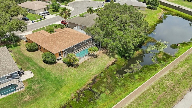 bird's eye view with a water view