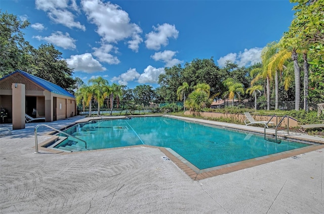 view of swimming pool featuring a patio