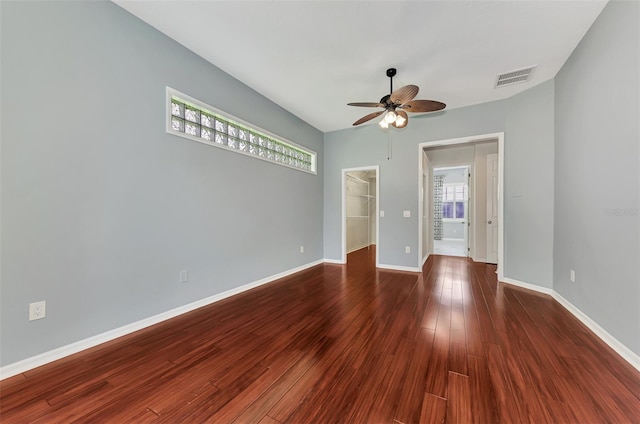 empty room featuring hardwood / wood-style floors and ceiling fan