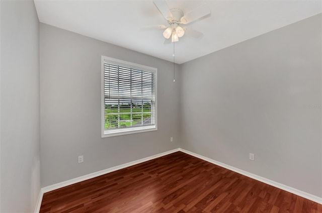 empty room featuring hardwood / wood-style flooring and ceiling fan