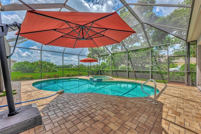 view of swimming pool with glass enclosure, an in ground hot tub, and a patio