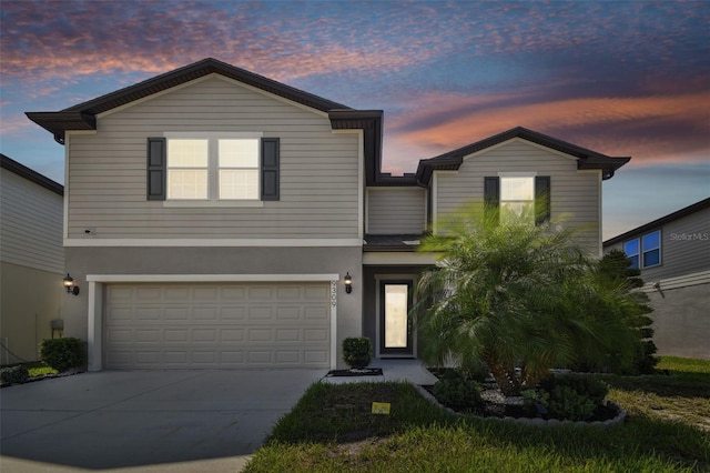 view of front of property featuring a garage