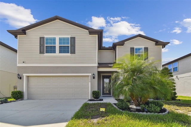 view of front of property with a garage