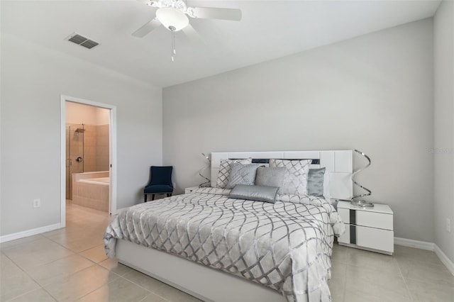 tiled bedroom featuring ceiling fan and connected bathroom