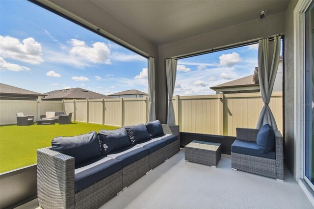 exterior space featuring an outdoor hangout area