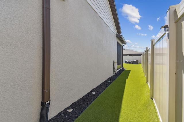 view of home's exterior featuring a lawn